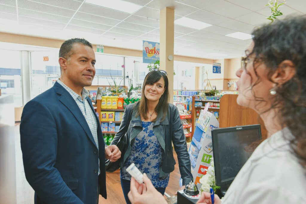 Man picking up prescription